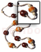 Seeds  Necklaces 2-3mm Coco Pklt. Bleach W/ 20mm Round Wrapped Wood Beads In Orange Tones W/ Rubber Seed And Wood Beads Combi / 32 In.